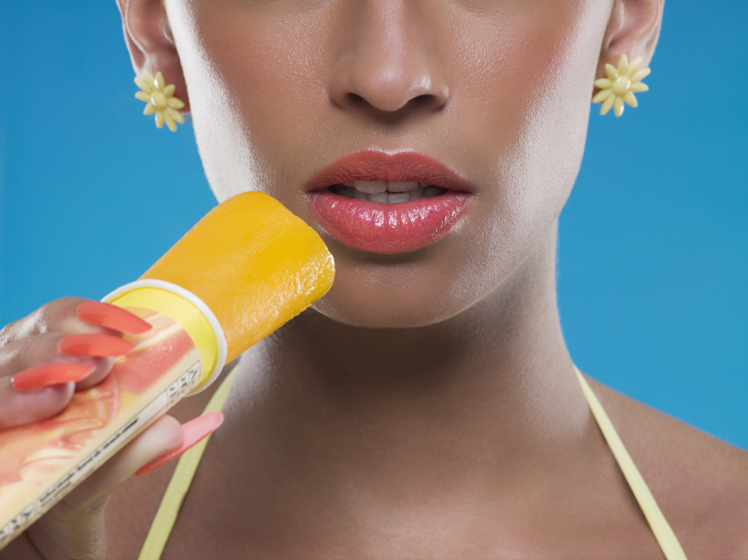 woman eating popsicle